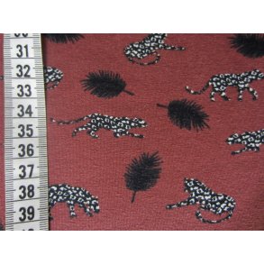 Rd med leoparder og fjer